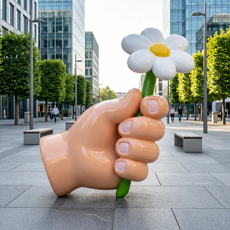 Hand Holding Flower Sculpture